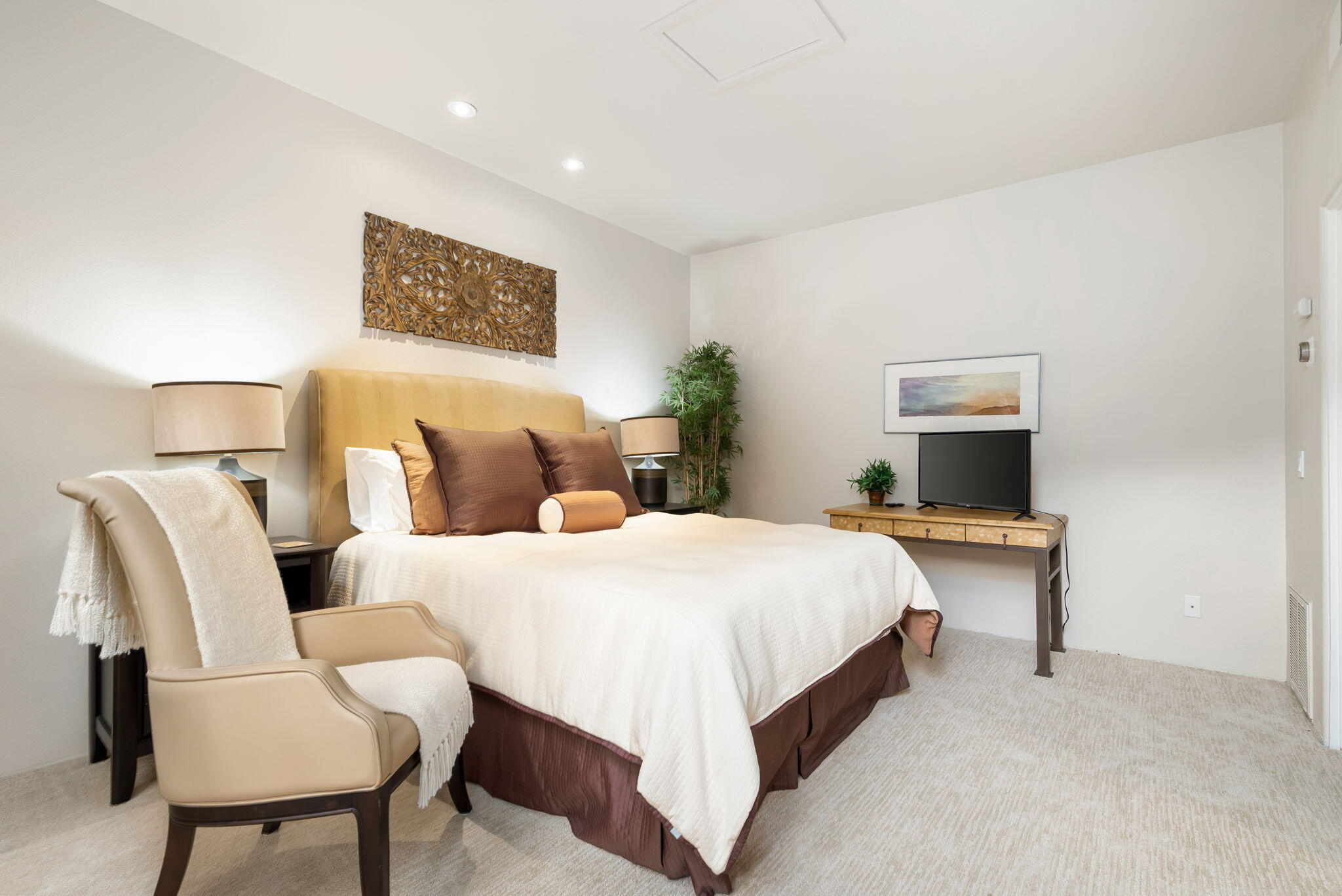56685 Merion La Quinta, CA 92253 - Photo 52 of 82 a bed room with a bed and chair