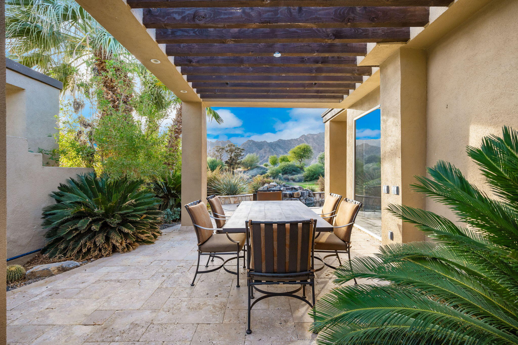 56685 Merion La Quinta, CA 92253 - Photo 55 of 82 a view of an outdoor sitting area with furniture and garden