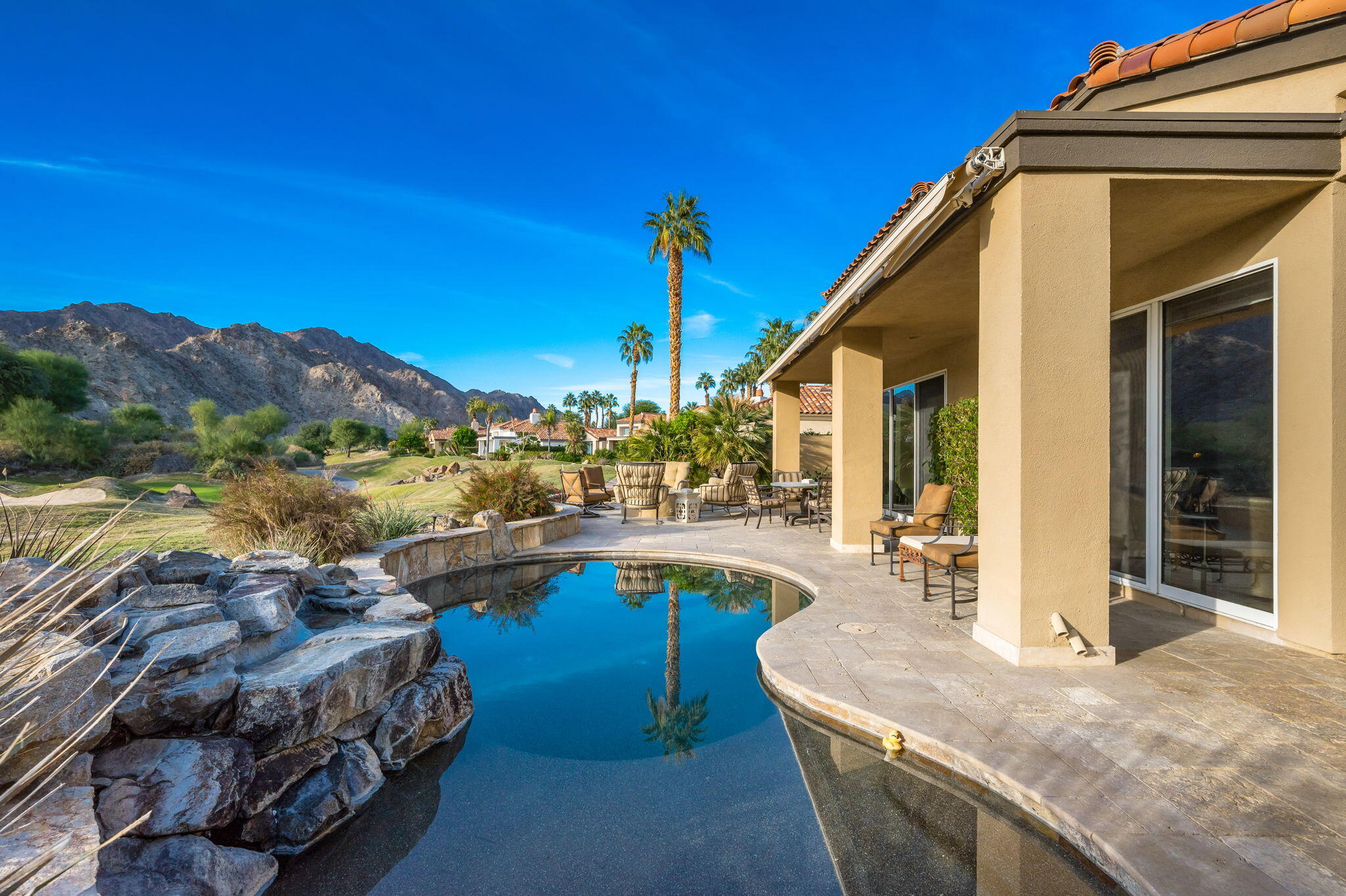 56685 Merion La Quinta, CA 92253 - Photo 62 of 82 a view of a house with pool and chairs