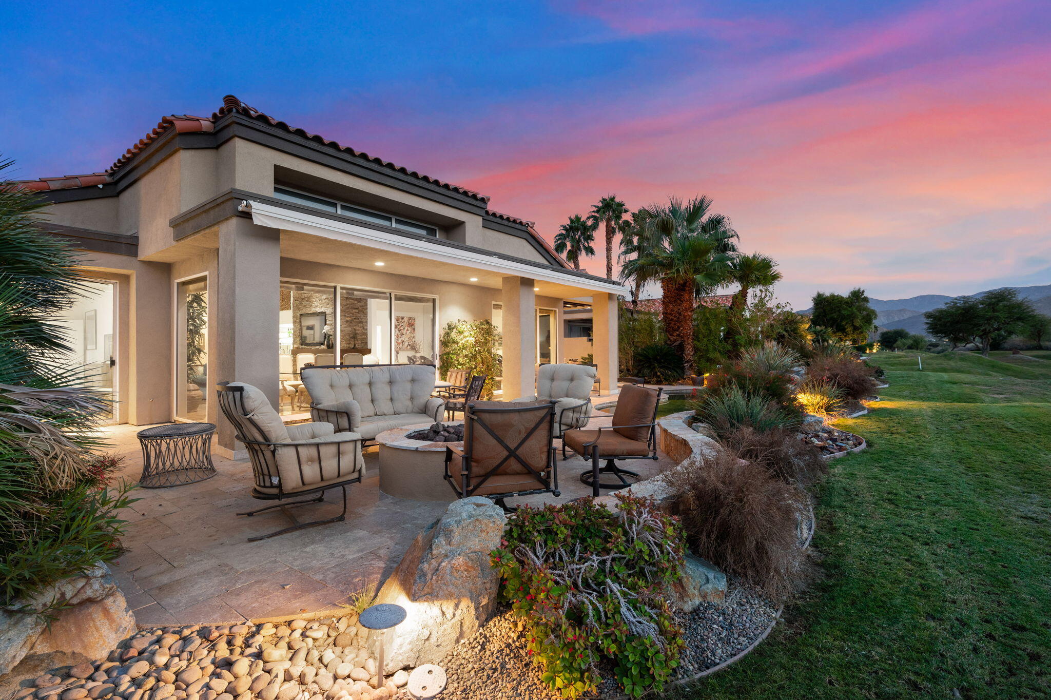56685 Merion La Quinta, CA 92253 - Photo 77 of 82 a view of a patio with table and chairs and potted plants