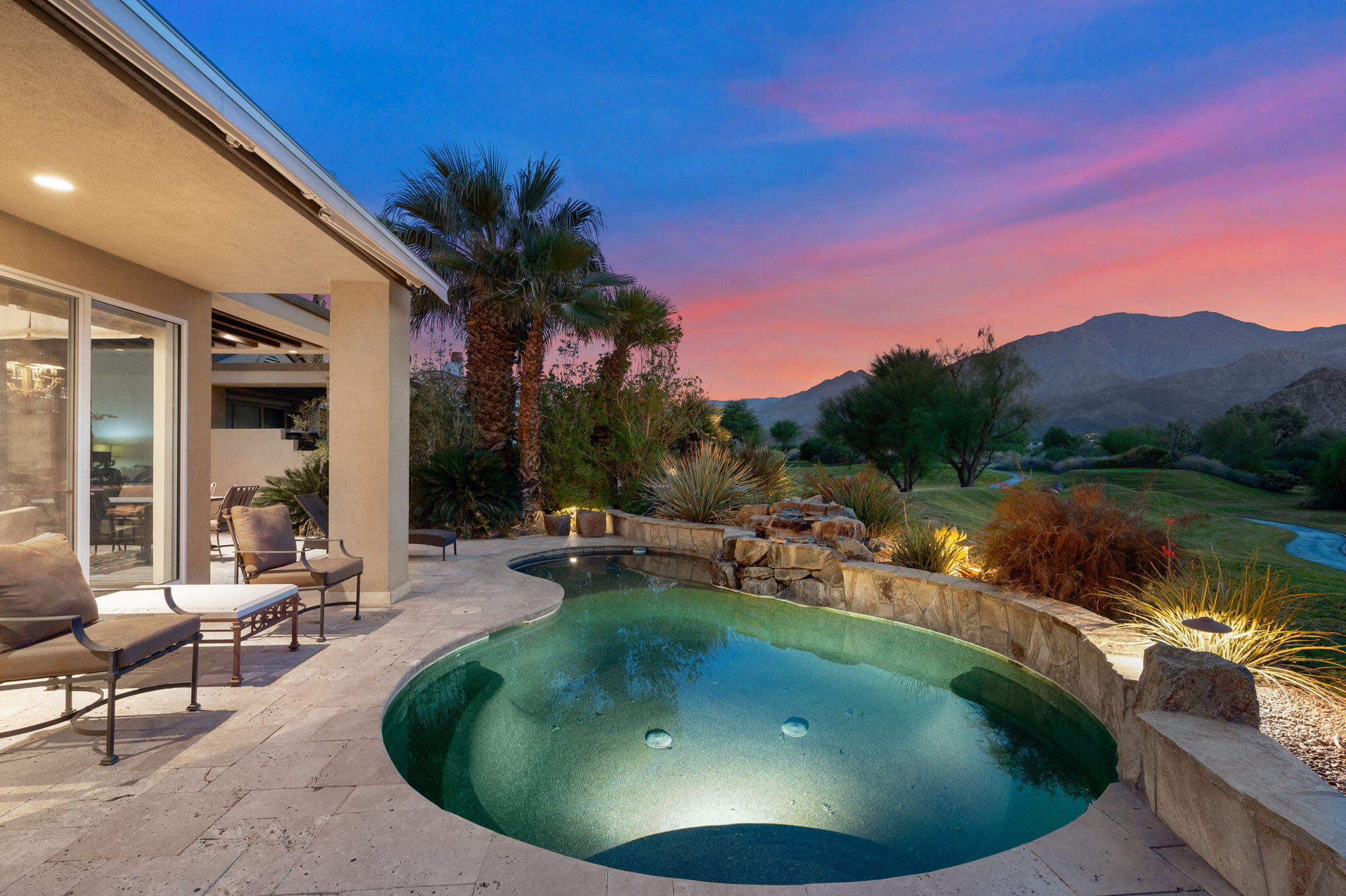 56685 Merion La Quinta, CA 92253 - Photo 8 of 82 a view of a swimming pool with a patio