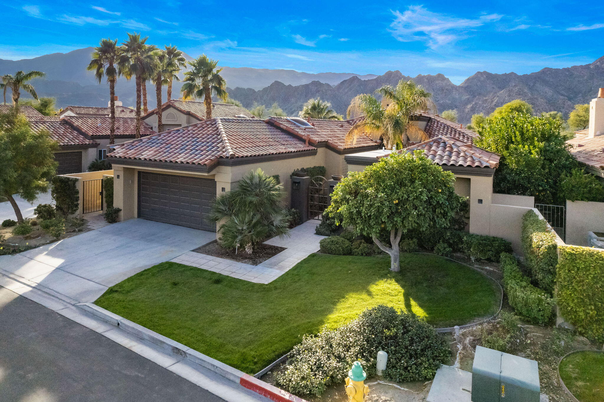 56685 Merion La Quinta, CA 92253 - Photo 81 of 82 a view of a house with a yard and a garden