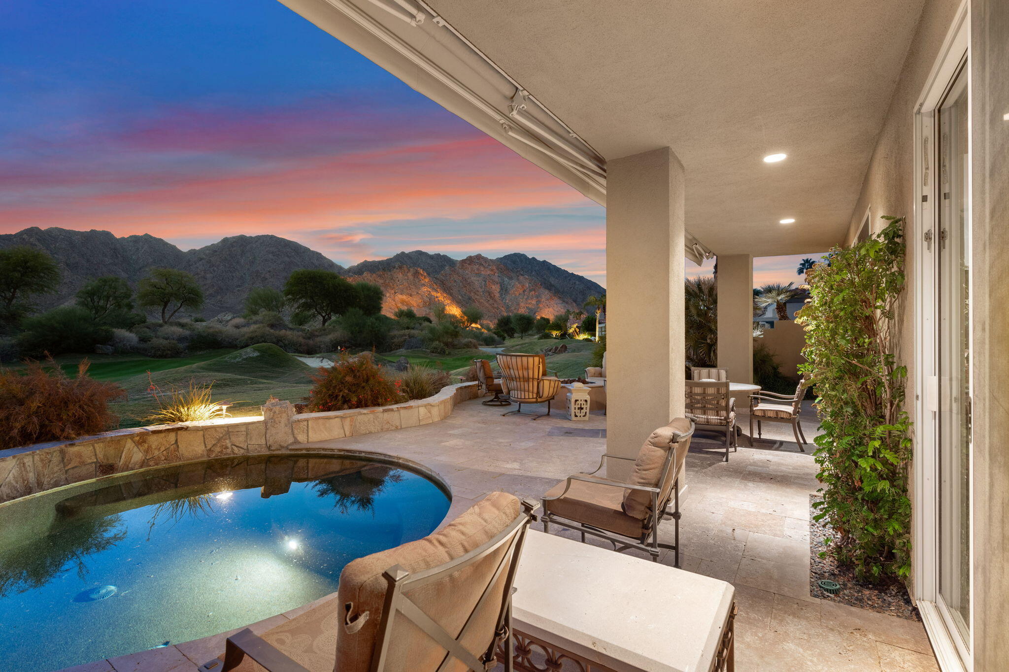 56685 Merion La Quinta, CA 92253 - Photo 9 of 82 a view of a swimming pool with a patio and a lake view