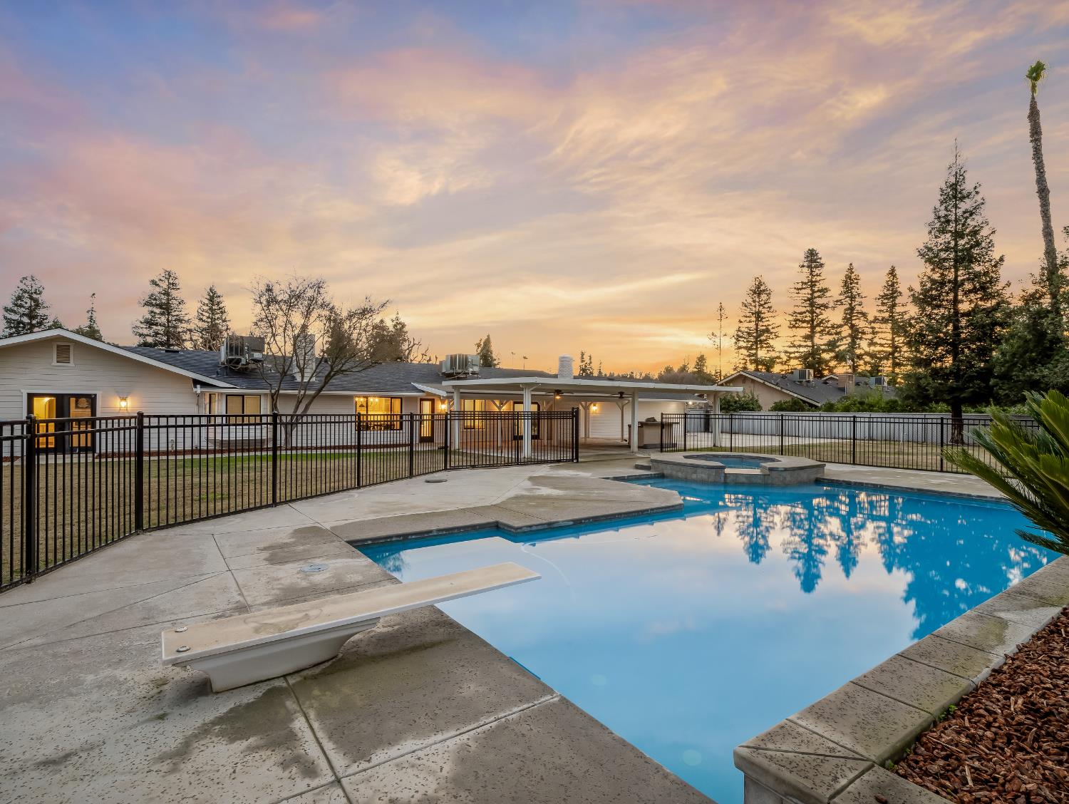7284 West Rialto Avenue Fresno, CA 93723 - Photo 5 of 60 a view of swimming pool with outdoor seating
