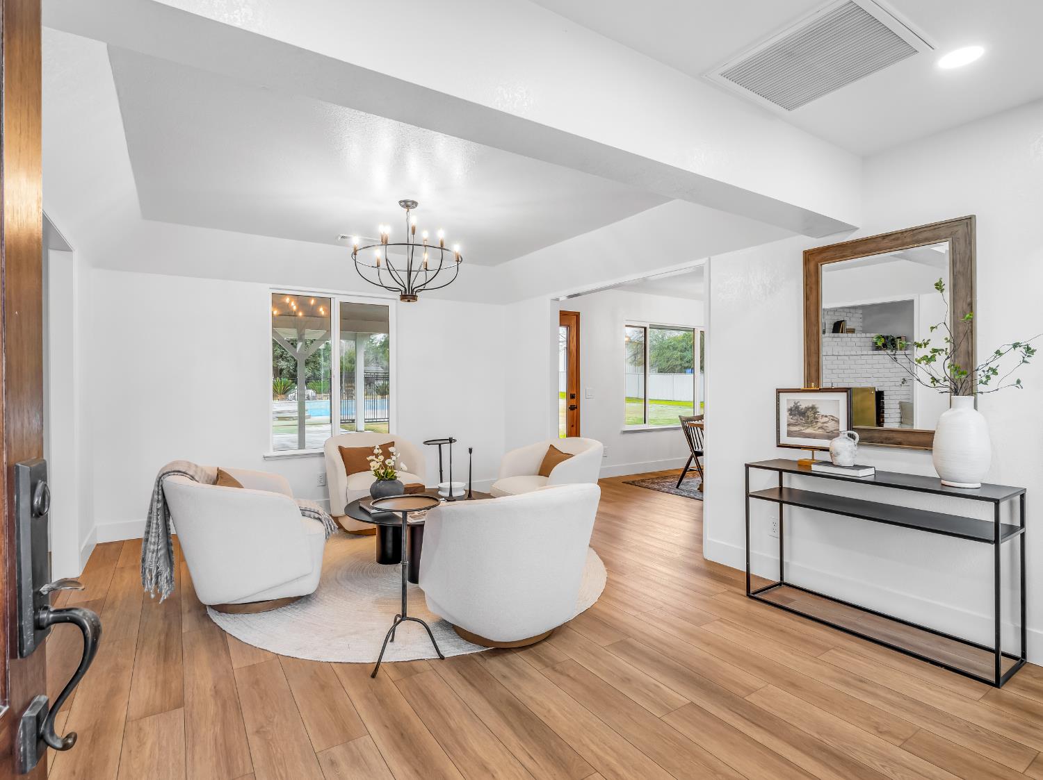 7284 West Rialto Avenue Fresno, CA 93723 - Photo 10 of 60 a living room with furniture and a large window