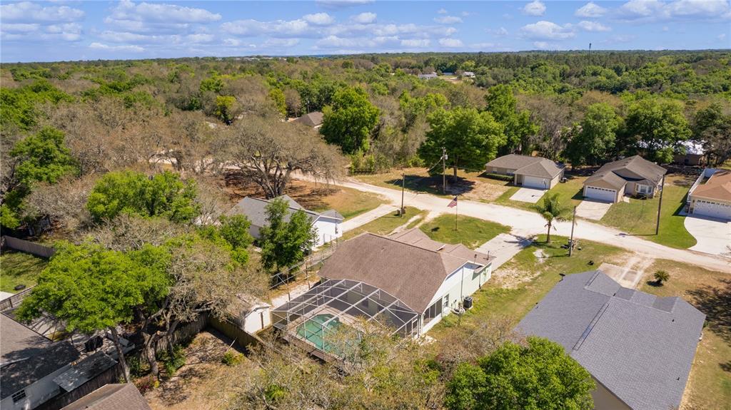 40045 Palm Street Lady Lake, FL 32159 - Photo 13 of 50 an aerial view of residential house with outdoor space and swimming pool
