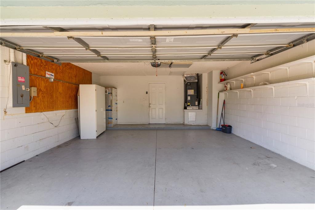40045 Palm Street Lady Lake, FL 32159 - Photo 14 of 50 a view of a garage