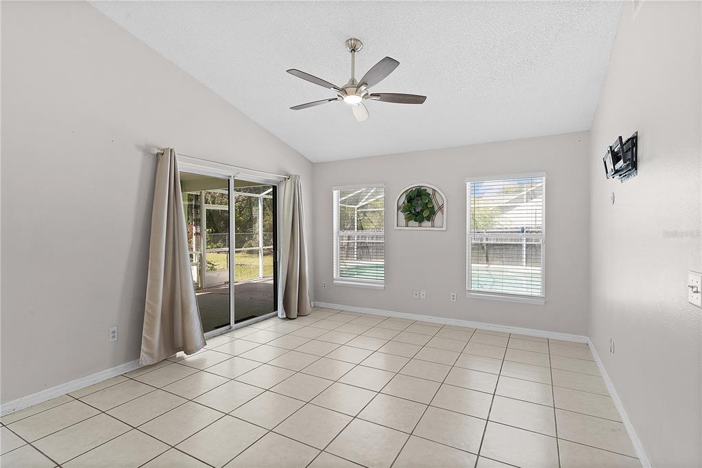 40045 Palm Street Lady Lake, FL 32159 - Photo 43 of 50 a view of an empty room with a window