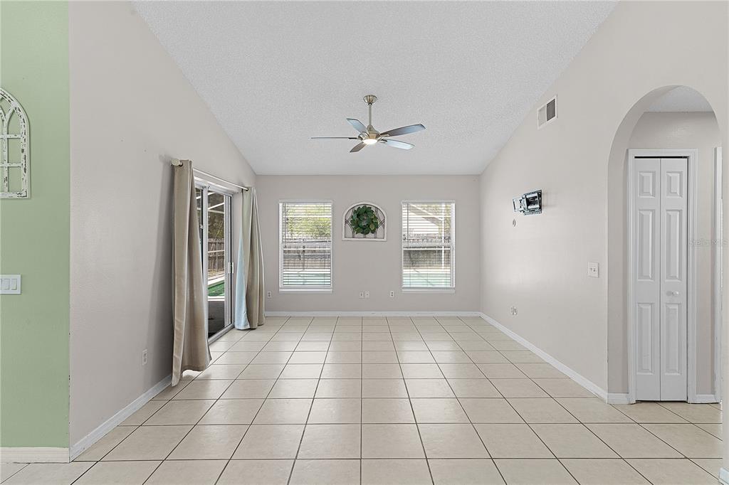 40045 Palm Street Lady Lake, FL 32159 - Photo 45 of 50 a view of an empty room with a window