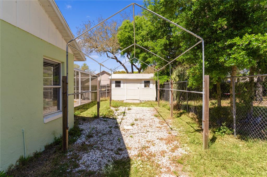 40045 Palm Street Lady Lake, FL 32159 - Photo 6 of 50 a house view with a backyard space