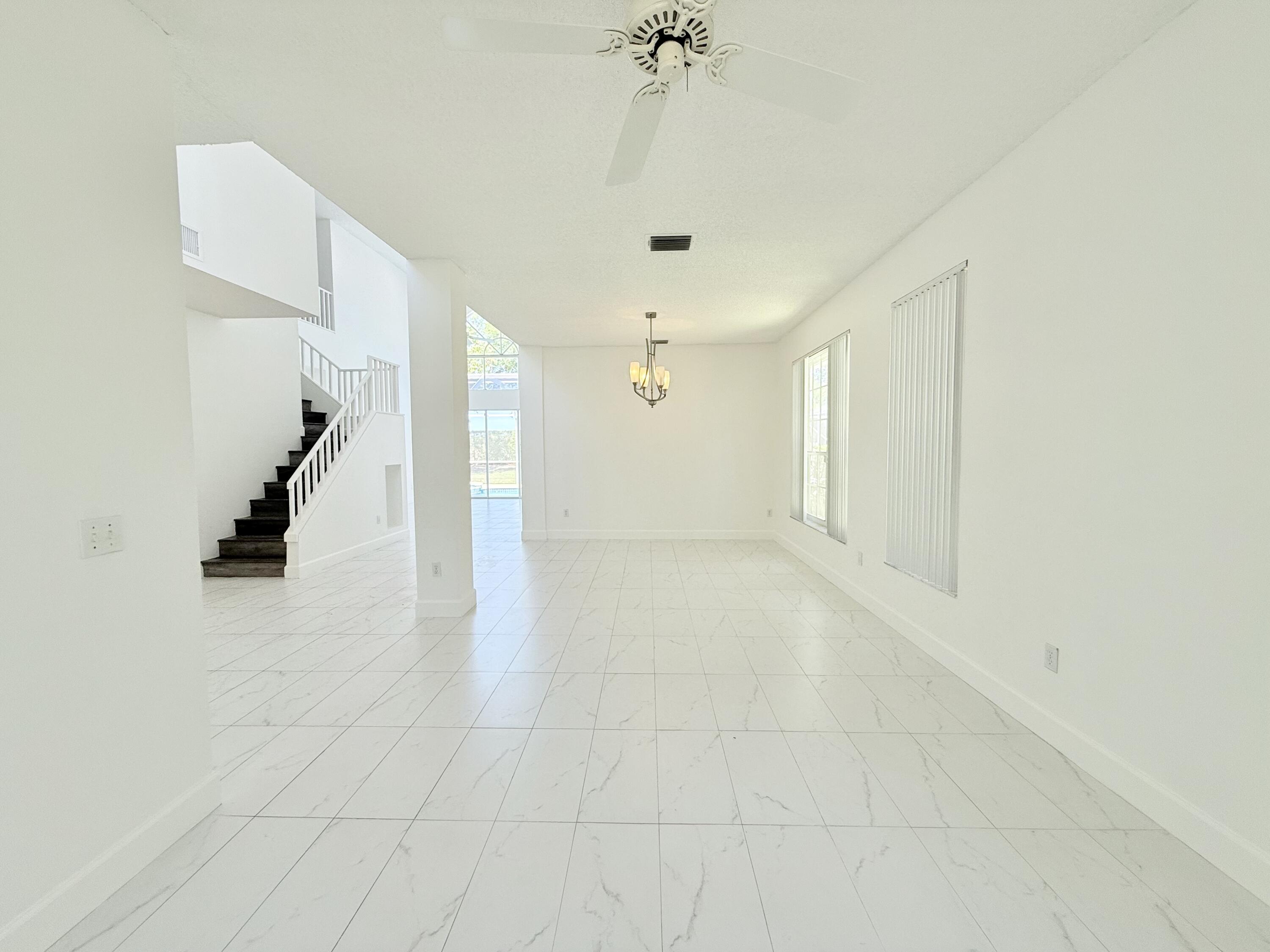 10875 Old Bridgeport Lane Boca Raton, FL 33498 - Photo 7 of 39 FORMAL LIVING + DINING ROOM