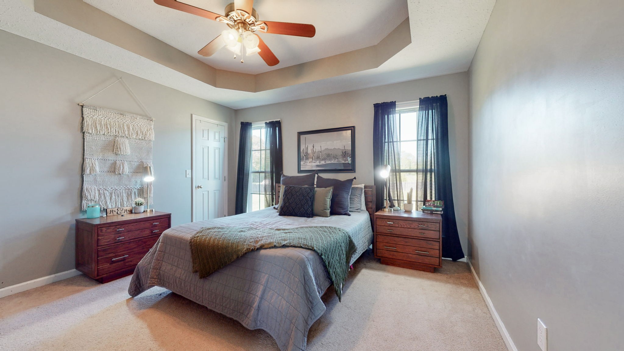 113 Wells Lee Road Elora, TN 37328 - Photo 17 of 39 a spacious bedroom with a bed and a chandelier