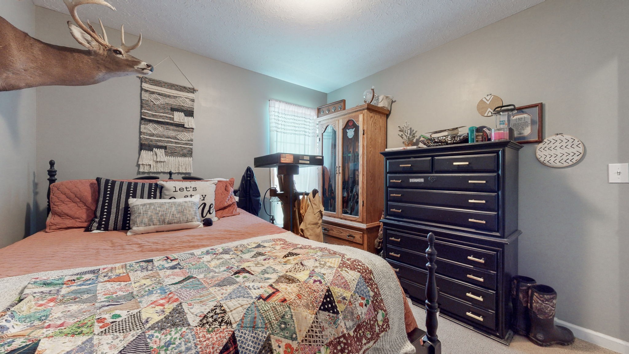 113 Wells Lee Road Elora, TN 37328 - Photo 23 of 39 a bedroom with a bed and a closet