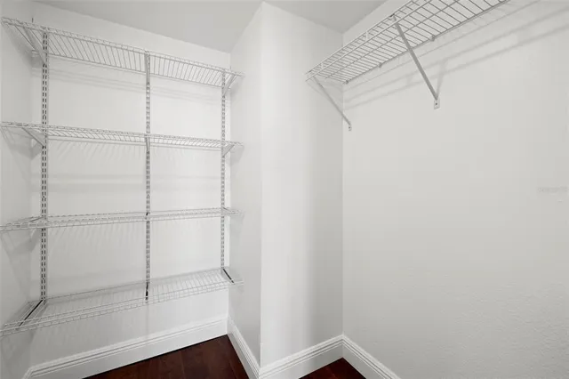 a view of a room with racks on the wall