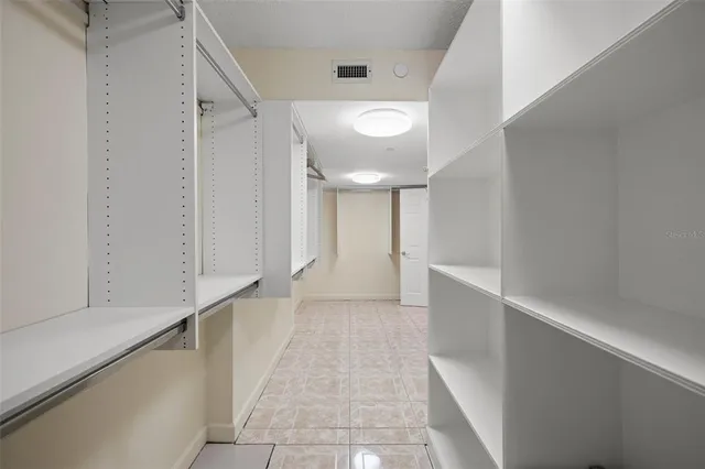 a view of a hallway with a white walls