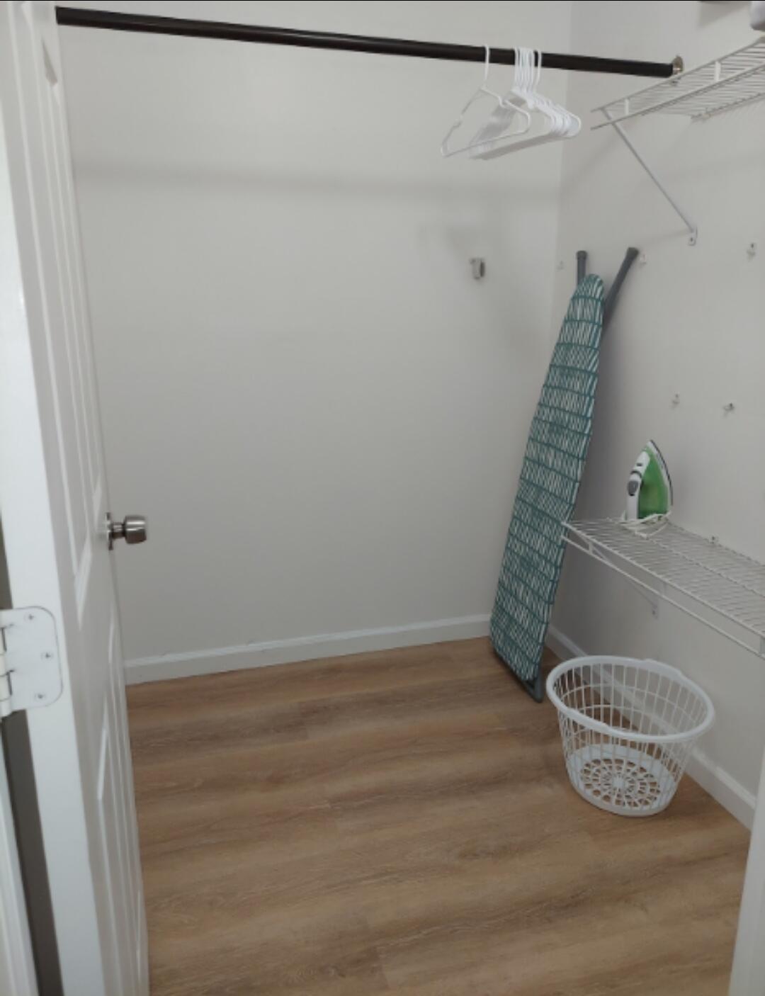 1401 West 9th Street Riviera Beach, FL 33404 - Photo 7 of 17 a view of small space with racks on the wall