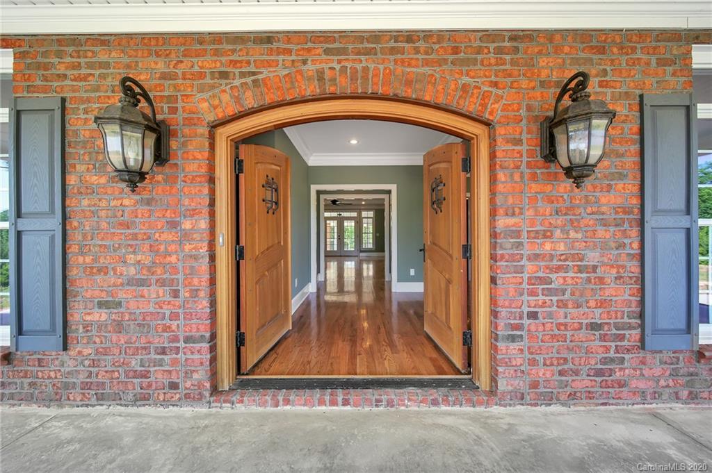 3705 Mining Road Kershaw, SC 29067 - Photo 2 of 47 a view of a door with a wooden door