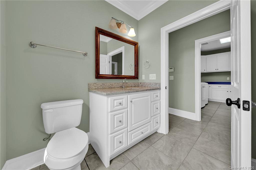 3705 Mining Road Kershaw, SC 29067 - Photo 14 of 47 a bathroom with a toilet sink and mirror