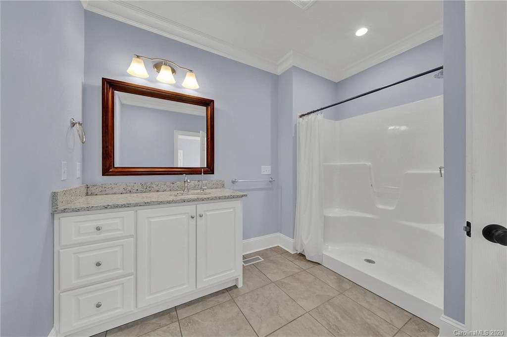 3705 Mining Road Kershaw, SC 29067 - Photo 23 of 47 a bathroom with a toilet sink and shower