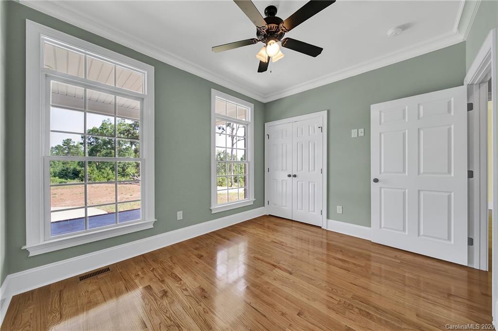3705 Mining Road Kershaw, SC 29067 - Photo 29 of 47 a view of an empty room with a window and wooden floor