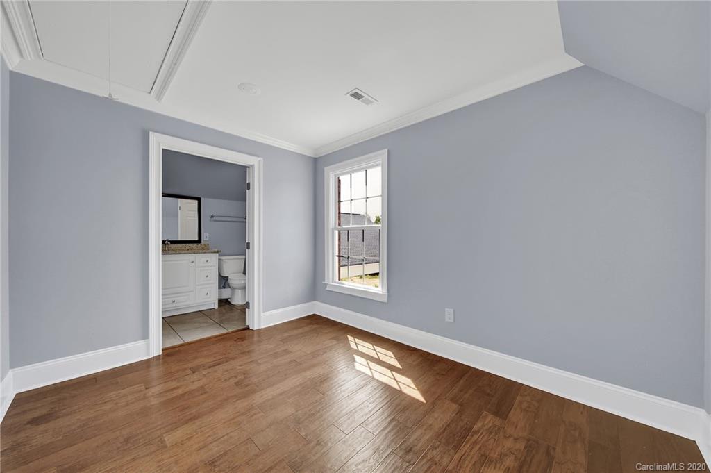 3705 Mining Road Kershaw, SC 29067 - Photo 31 of 47 an empty room with wooden floor and windows
