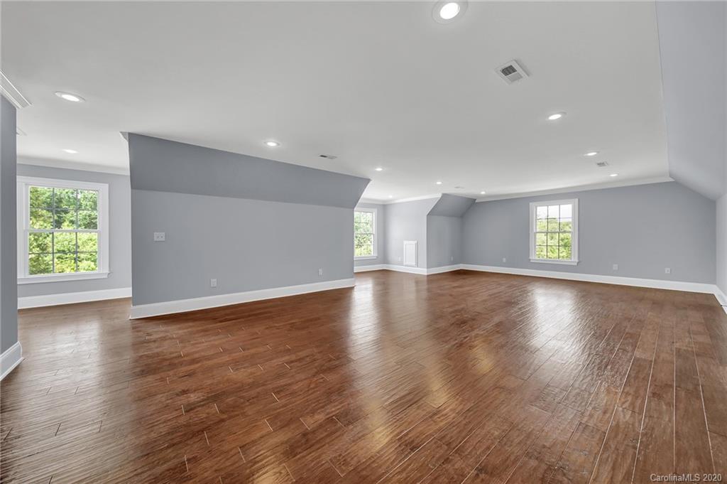 3705 Mining Road Kershaw, SC 29067 - Photo 36 of 47 an empty room with wooden floor and windows