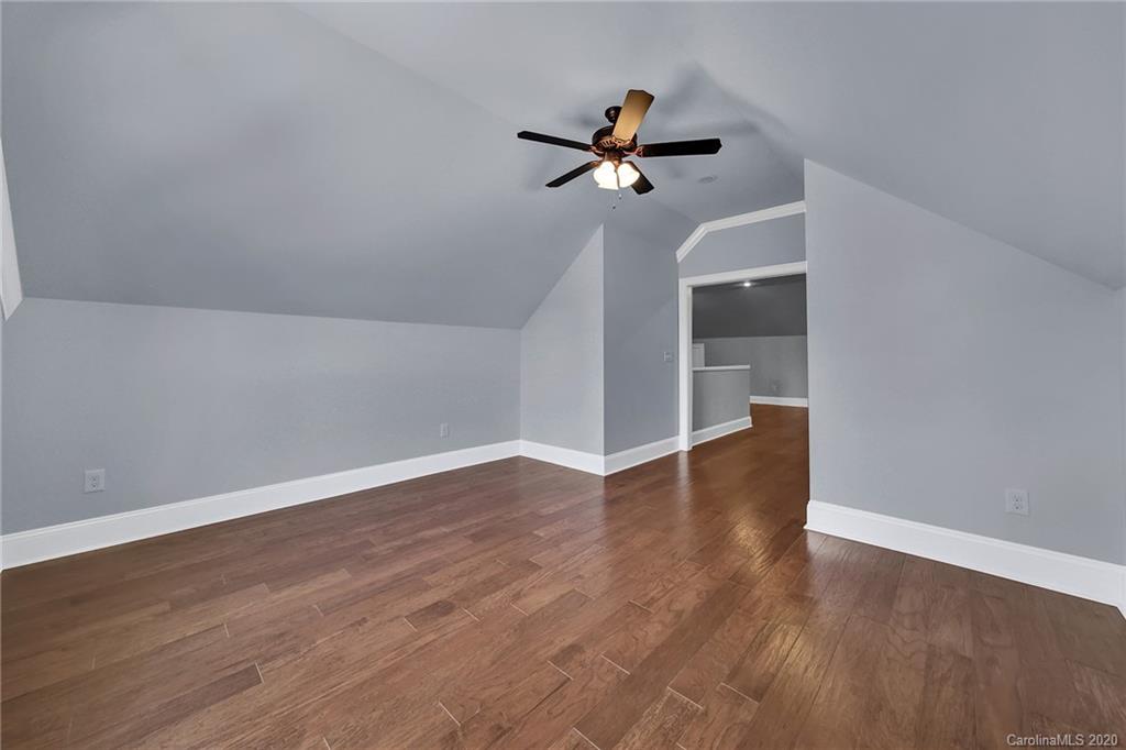 3705 Mining Road Kershaw, SC 29067 - Photo 39 of 47 a view of a room with wooden floor and ceiling fan