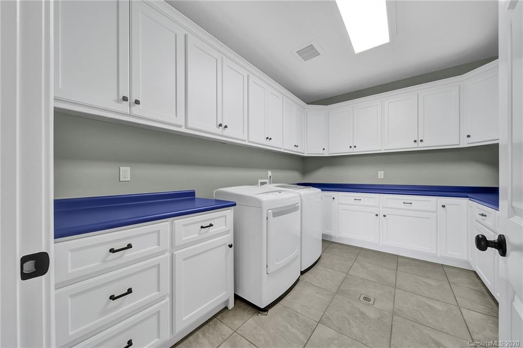 3705 Mining Road Kershaw, SC 29067 - Photo 44 of 47 a kitchen with white cabinets and white appliances