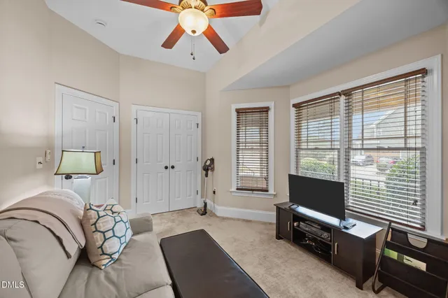 a spacious bathroom with a double vanity sink mirror double and shower