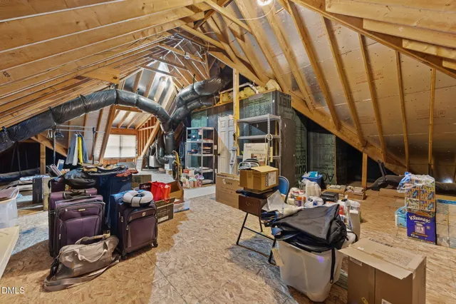 a view of a workspace with furniture