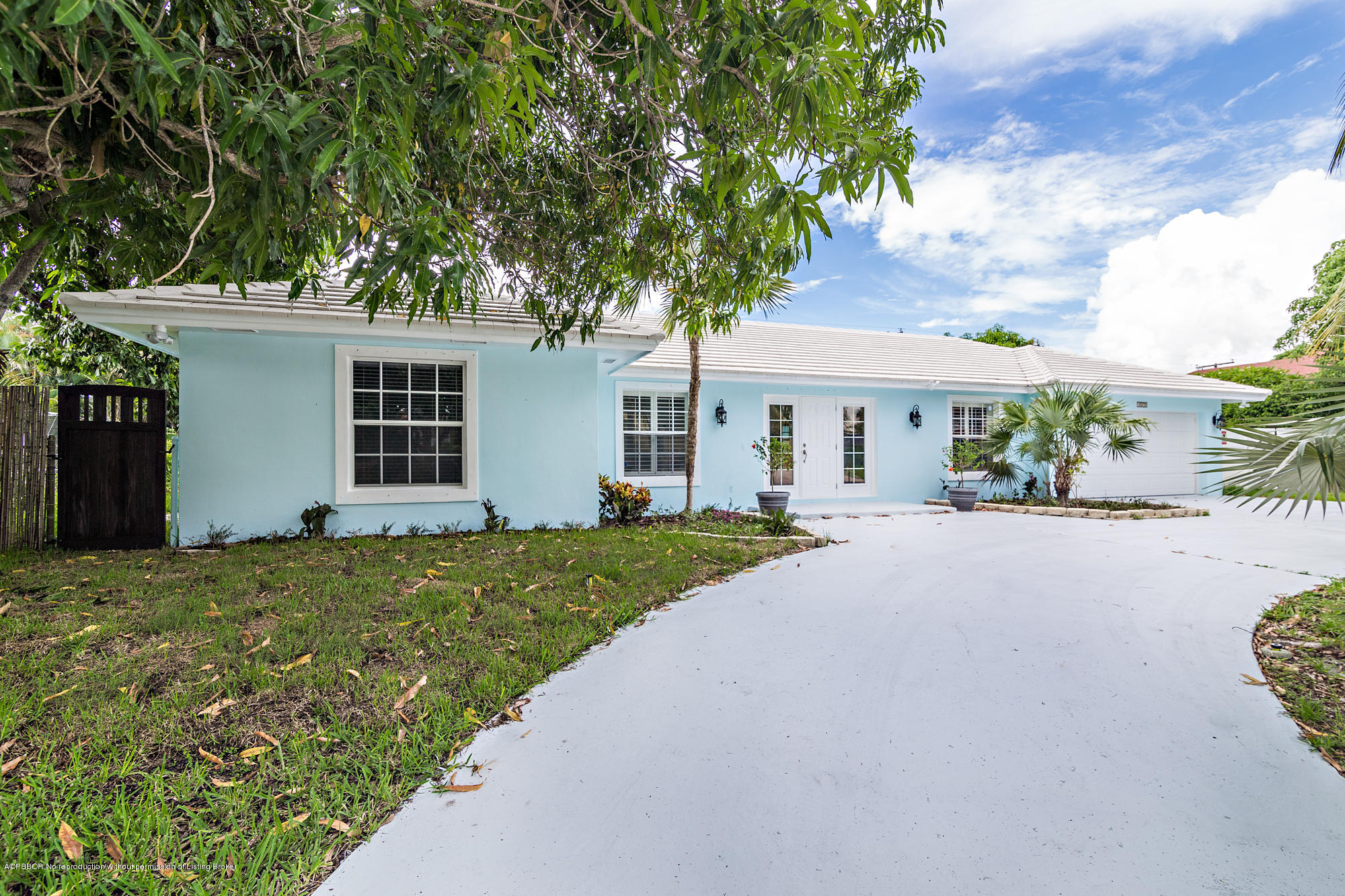 1870 Travis Road West Palm Beach, FL 33406 - Photo 2 of 35 front view of a house with a yard