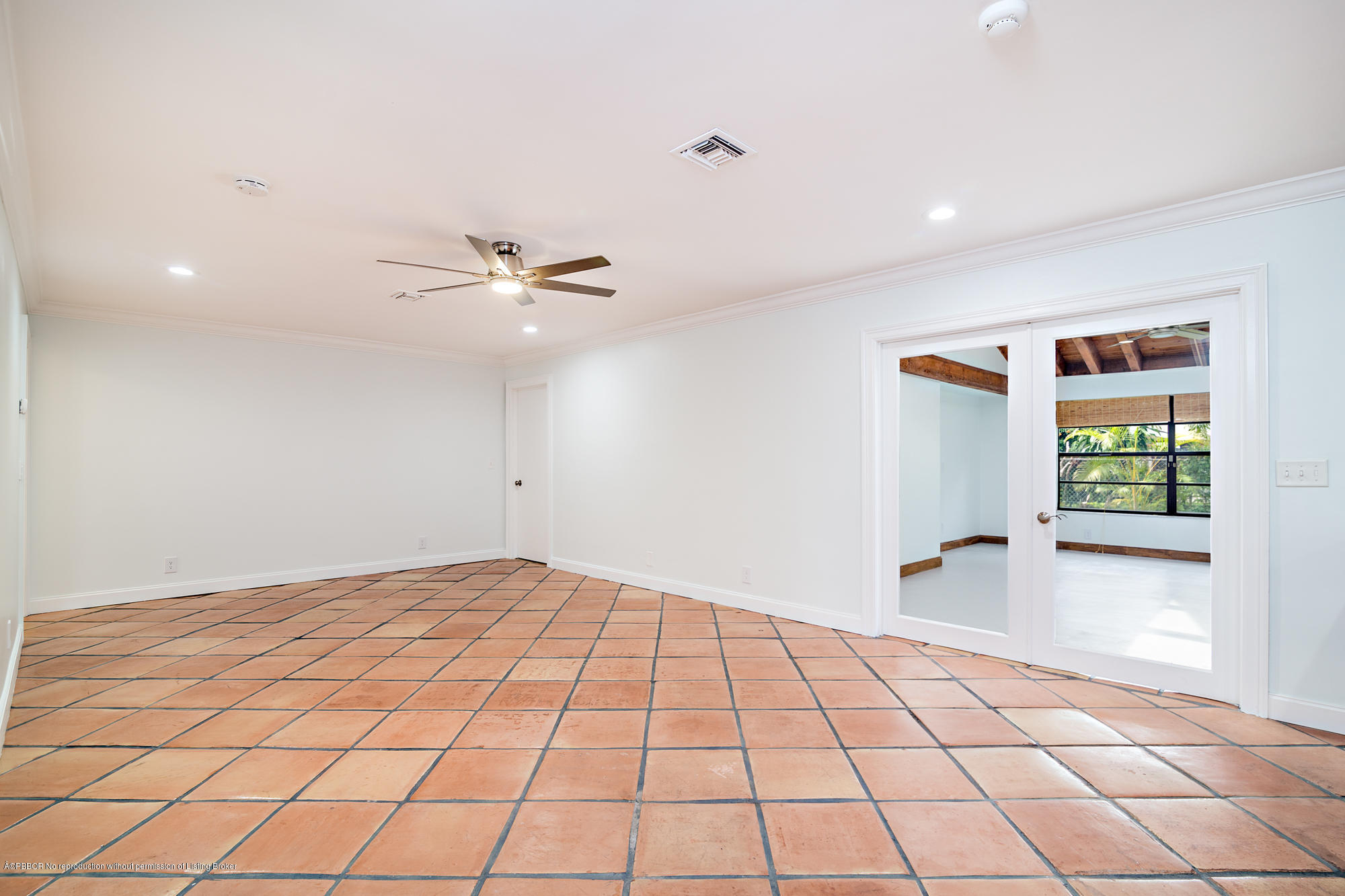 1870 Travis Road West Palm Beach, FL 33406 - Photo 12 of 35 a view of a livingroom with a ceiling fan and window