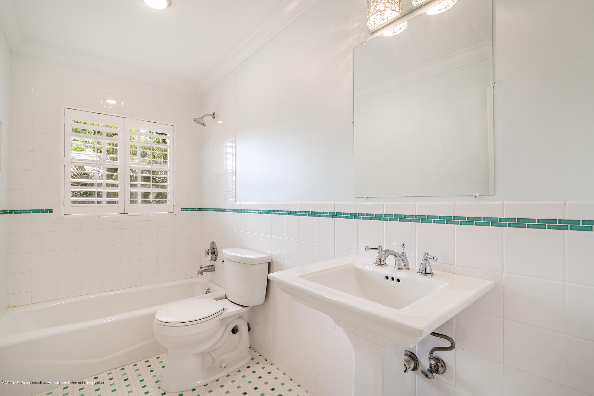 1870 Travis Road West Palm Beach, FL 33406 - Photo 22 of 35 a bathroom with a sink a toilet and shower