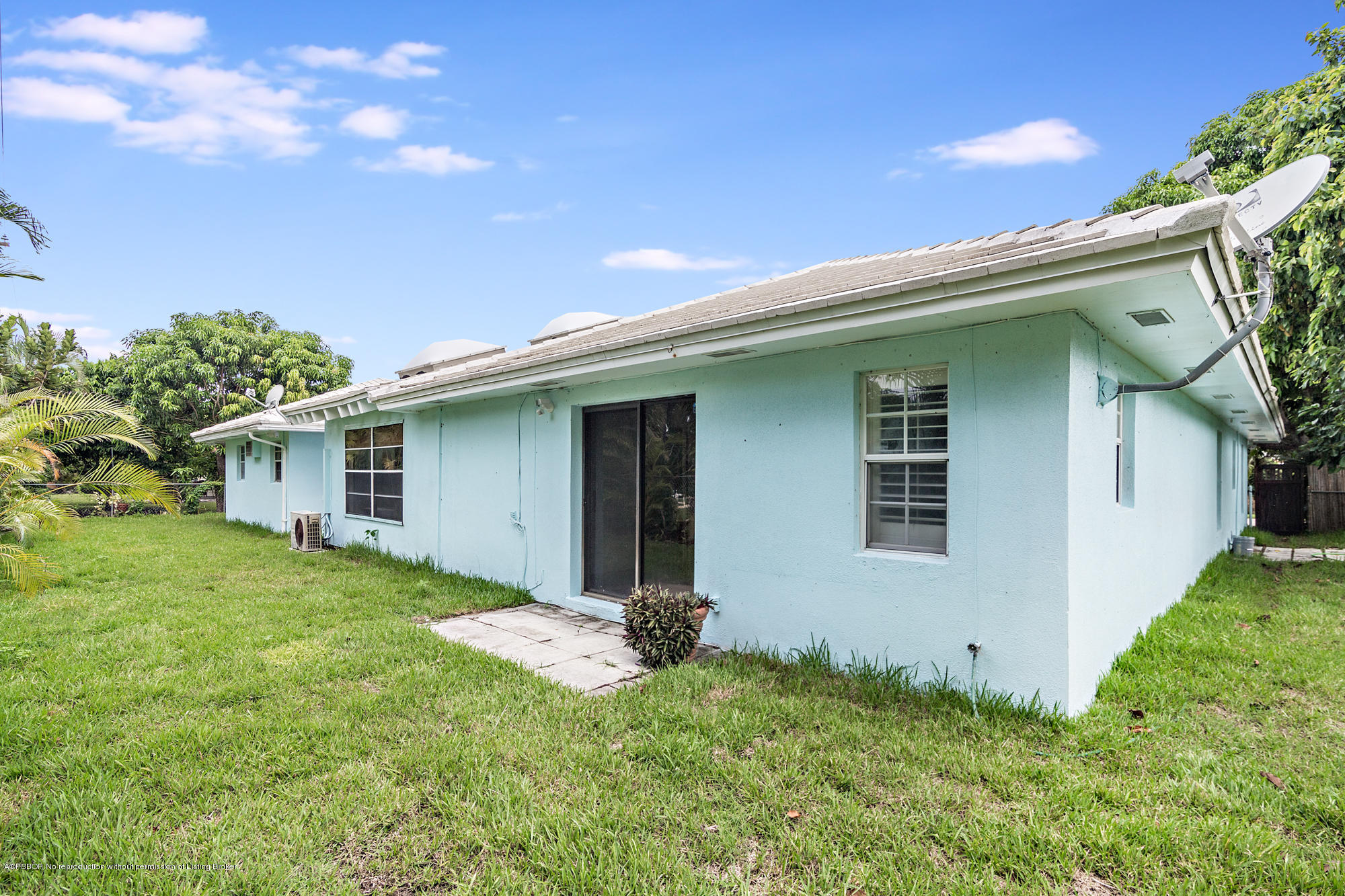 1870 Travis Road West Palm Beach, FL 33406 - Photo 25 of 35 a view of a house with a yard