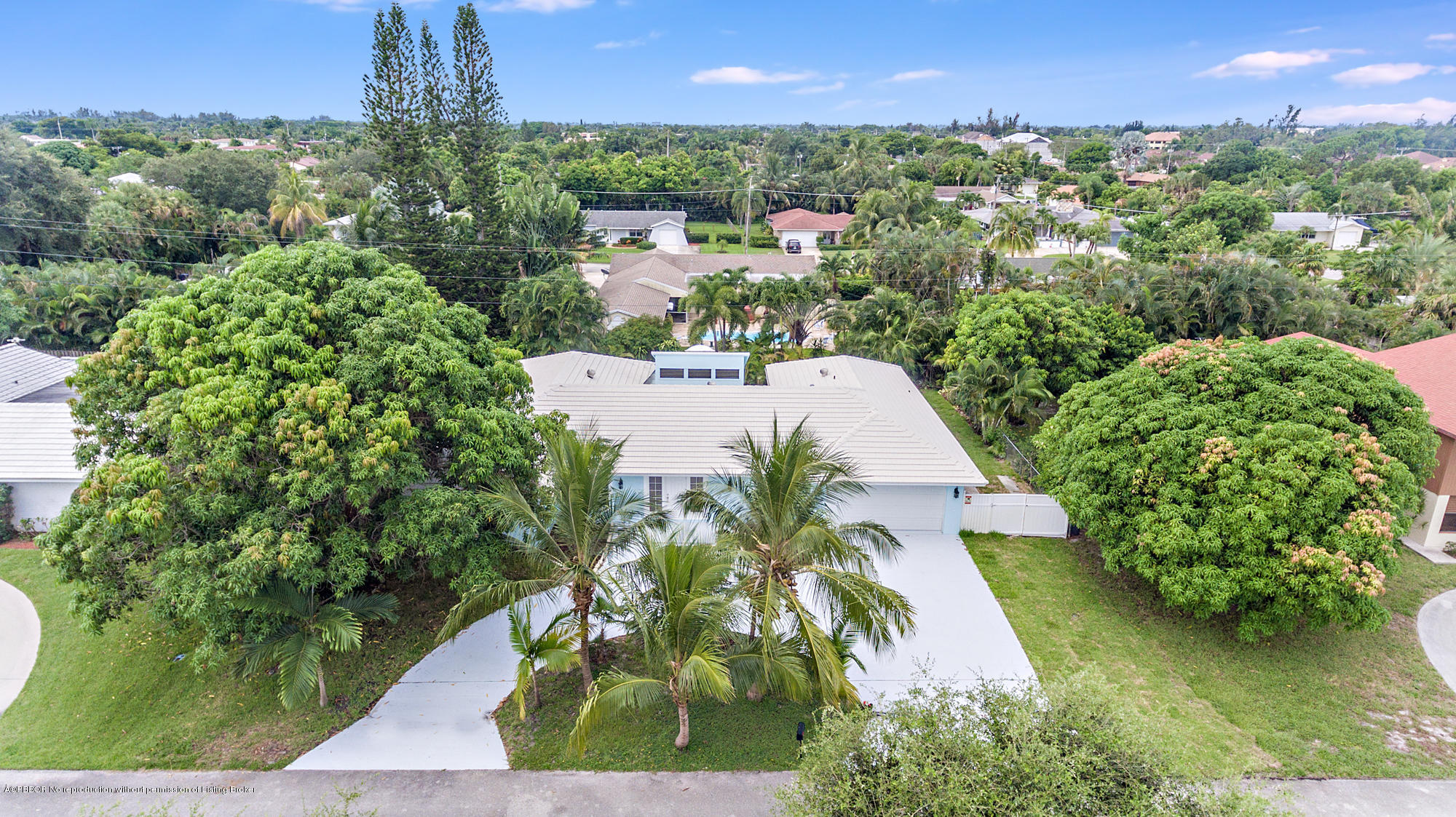 1870 Travis Road West Palm Beach, FL 33406 - Photo 31 of 35 an aerial view of residential houses with outdoor space and trees all around