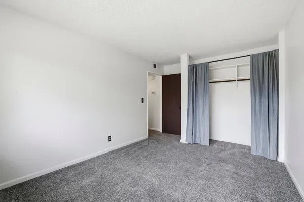 an empty room with window