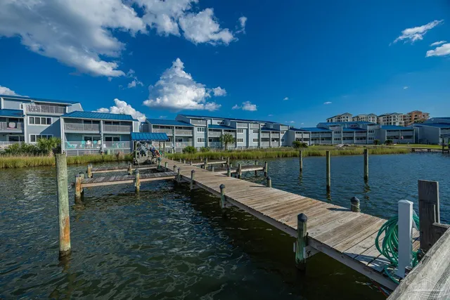 a view of a chairs and table in a patio