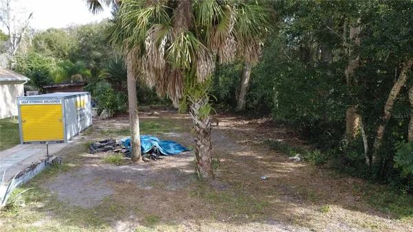 a view of a park with swings and slides