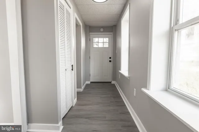 a bathroom with a toilet sink and shower