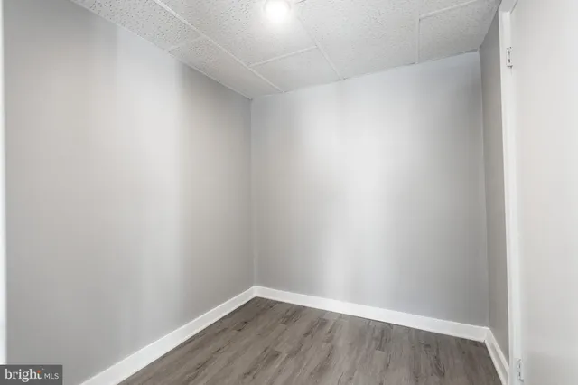 a bathroom with a toilet and a bathtub