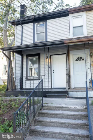 a view of a big yard with a house
