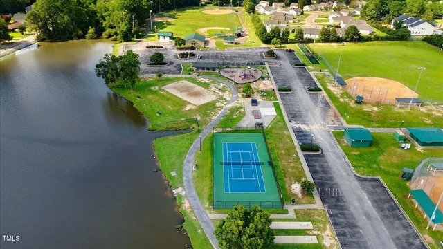 an aerial view of a house with a ocean view