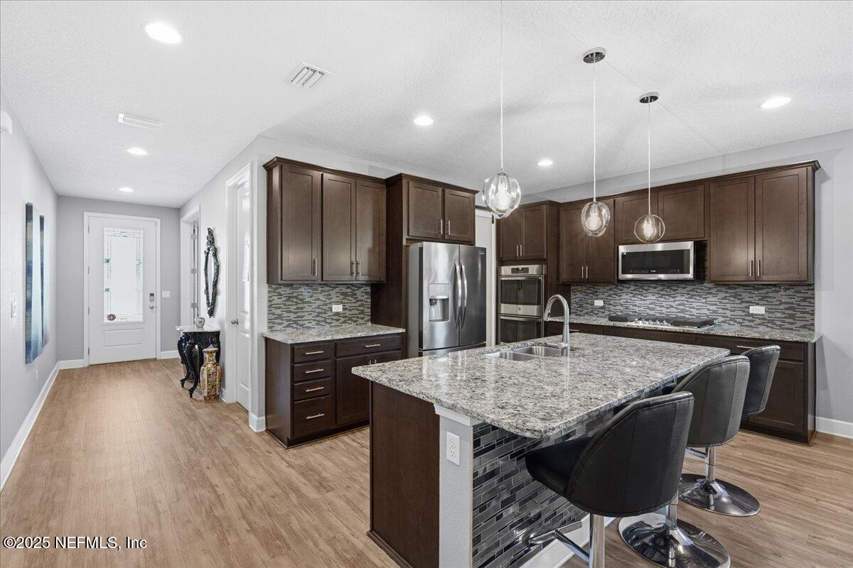 518 Rittburn Lane St. Johns, FL 32259 - Photo 6 of 59 42" Maple cabinets