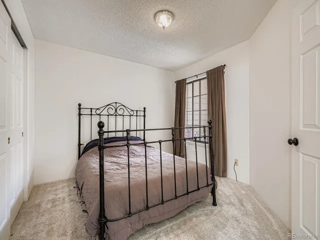 a view of staircase with wooden floor and windows