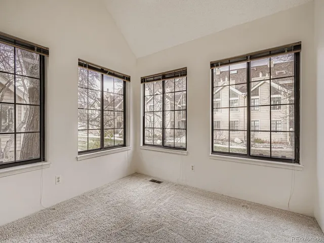 a bathroom with a shower and a toilet