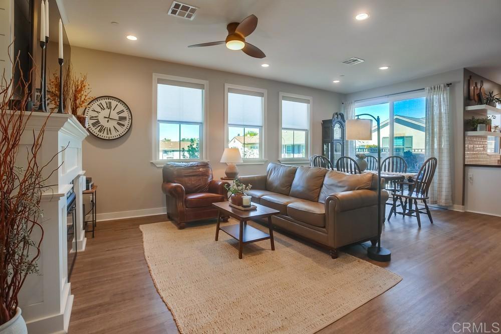 4326 Star Path Way, Unit 1 Oceanside, CA 92056 - Photo 13 of 72 a living room with furniture and a large window