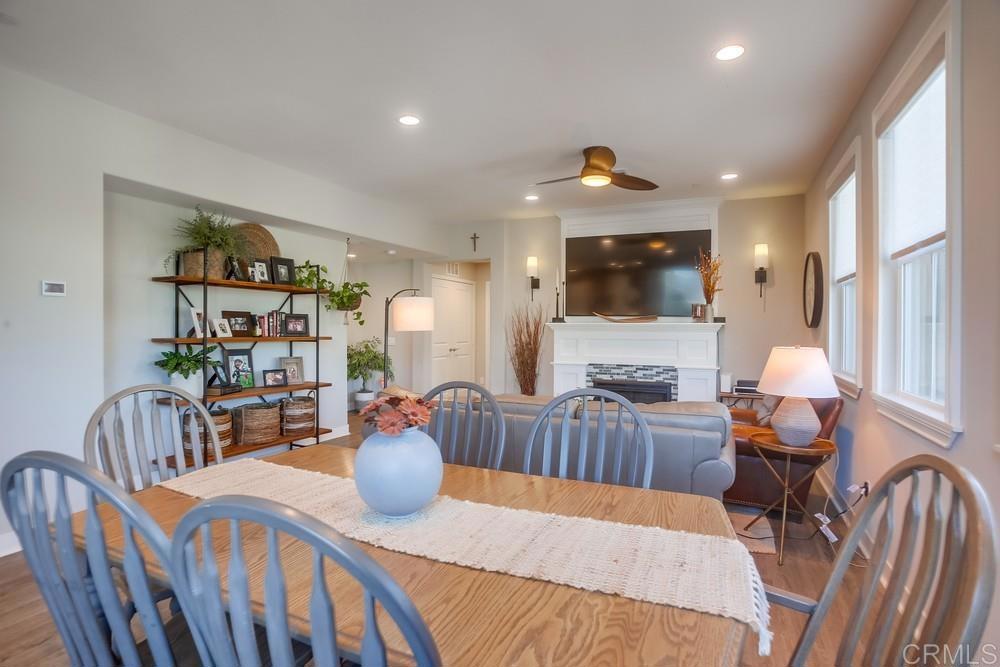 4326 Star Path Way, Unit 1 Oceanside, CA 92056 - Photo 21 of 72 a living room with furniture and a wooden floor
