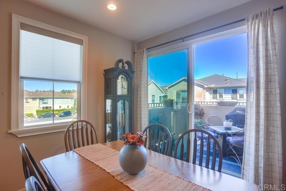 4326 Star Path Way, Unit 1 Oceanside, CA 92056 - Photo 22 of 72 a view of a dining room with furniture window and outside view