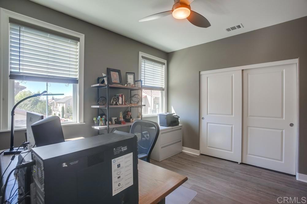 4326 Star Path Way, Unit 1 Oceanside, CA 92056 - Photo 34 of 72 a work room with furniture and a window