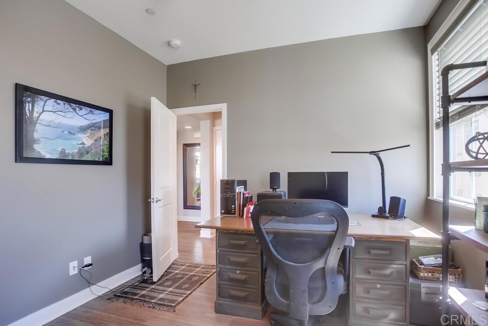 4326 Star Path Way, Unit 1 Oceanside, CA 92056 - Photo 36 of 72 a work room with furniture and a potted plant